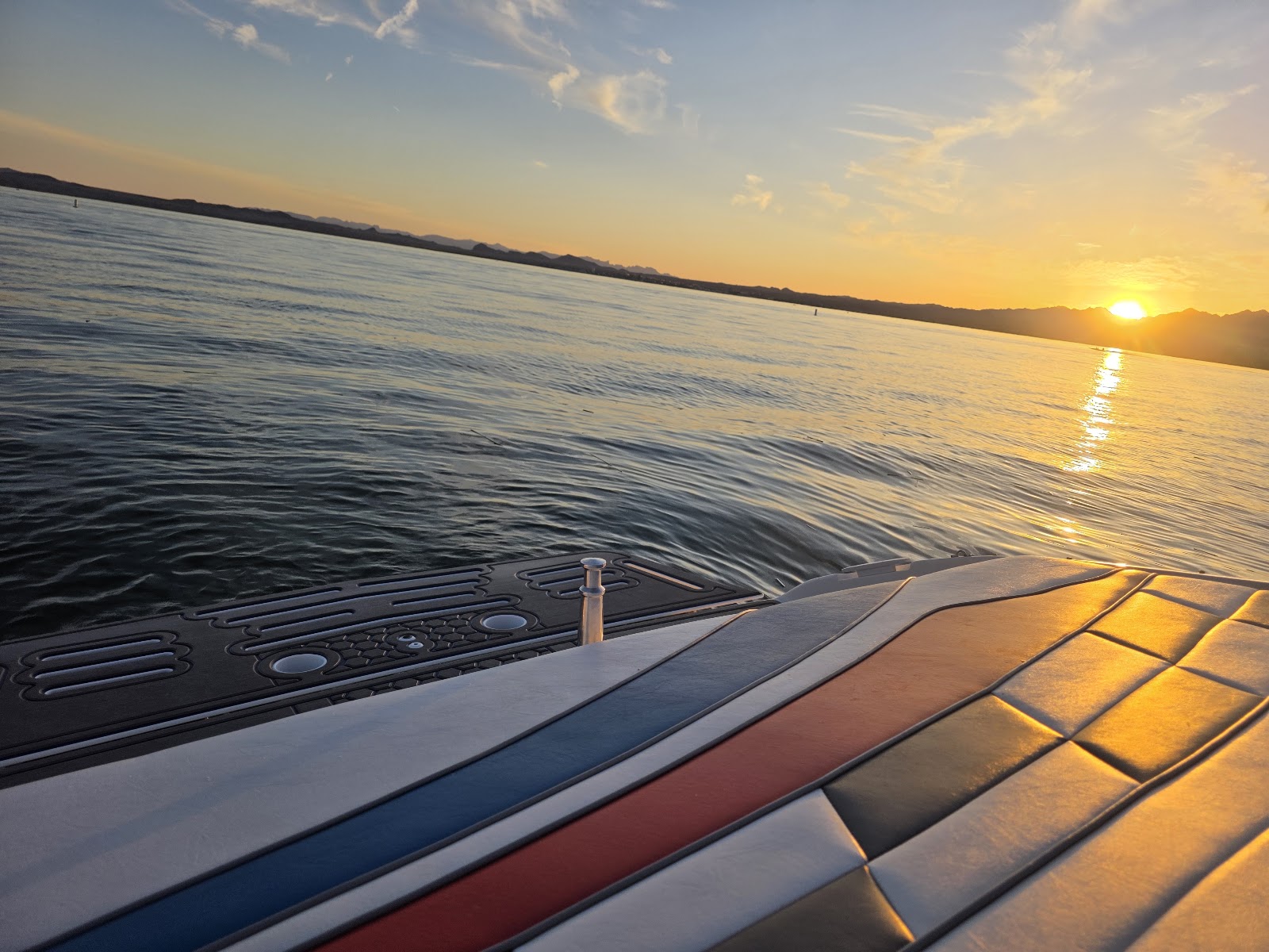 Sunset reflecting off a custom swim platform deck