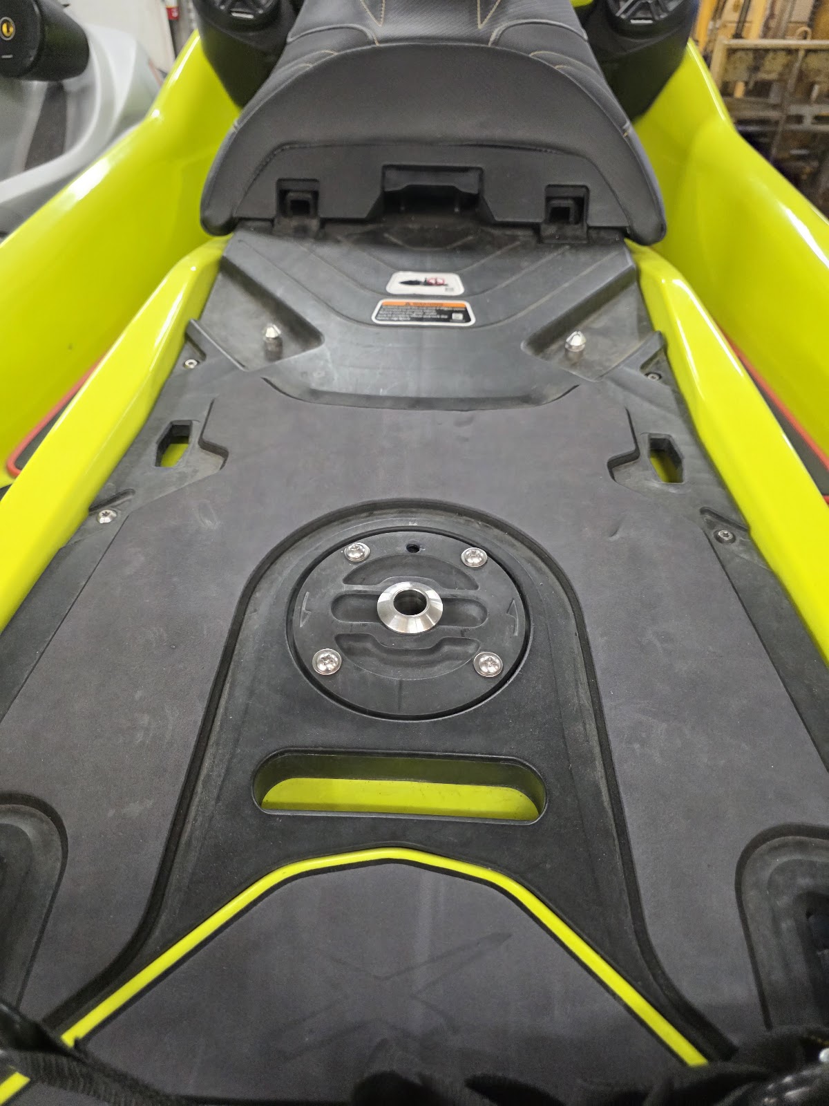 Close-up of gray and yellow marine decking on a watercraft